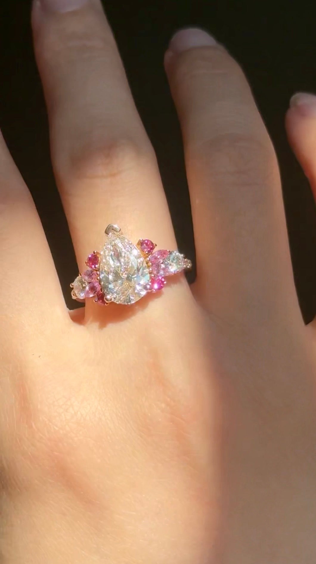 Nature inspired pear diamond ring with tourmaline accents
